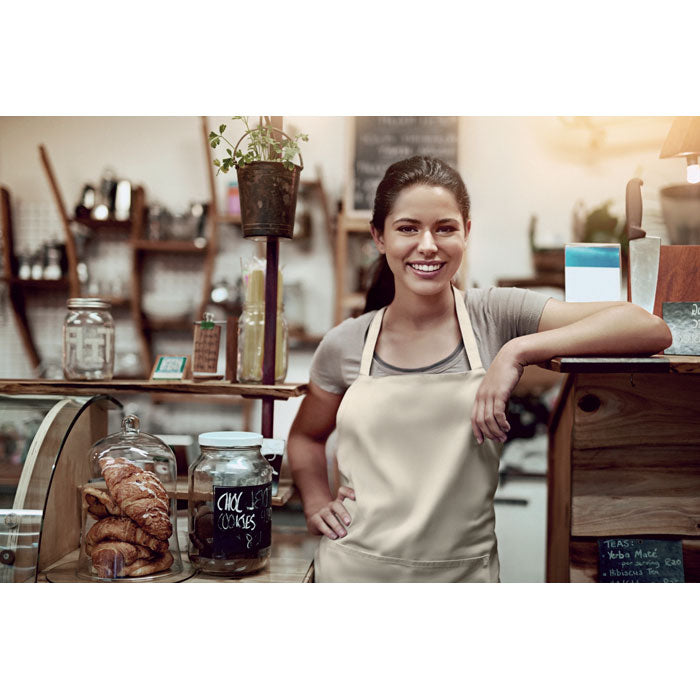 Branded Organic Cotton Kitchen Apron in Natural 200gsm in use
