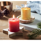 Branded Candle on Round Wooden Base in use