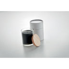Branded Vanilla Candle in Glass with Bamboo Lid in use