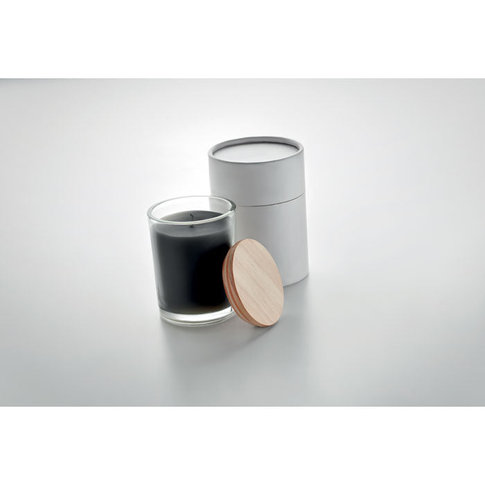 Branded Vanilla Candle in Glass with Bamboo Lid in use
