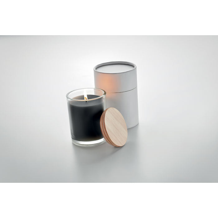 Branded Vanilla Candle in Glass with Bamboo Lid in use