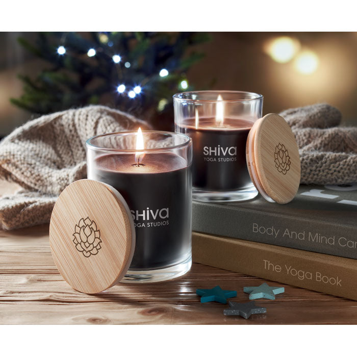 Branded Vanilla Candle in Glass with Bamboo Lid in use