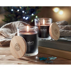 Branded Vanilla Candle in Glass with Bamboo Lid in use