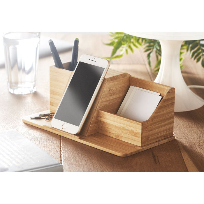 Branded Bamboo Pen & Phone Holder in use