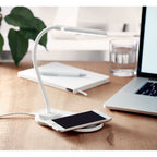 Branded Desktop Light with 10W Wireless Charger in use