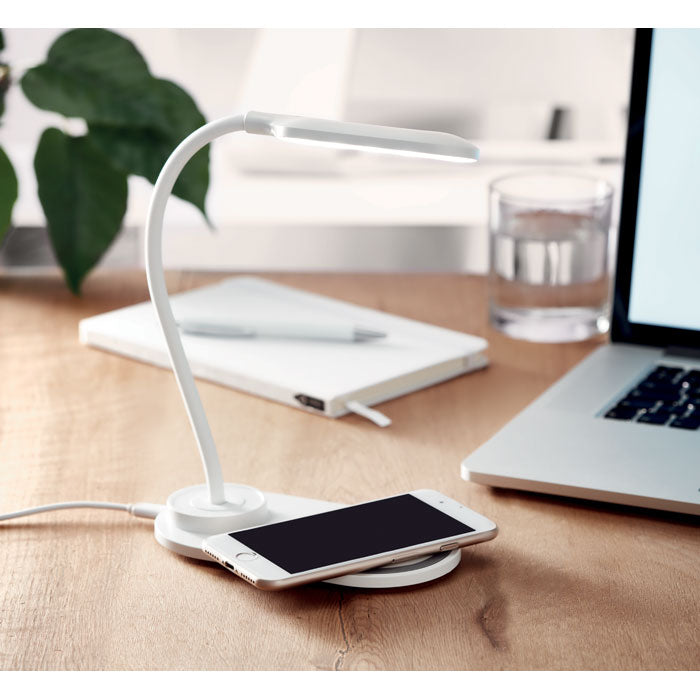 Branded Desktop Light with 10W Wireless Charger in use