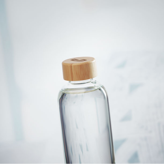 Branded Glass Bottle with Bamboo Lid - 650ml in use