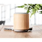 Branded Bamboo Cover Wireless Speaker in use