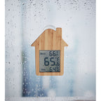 Branded House Shaped Bamboo Thermometer in use