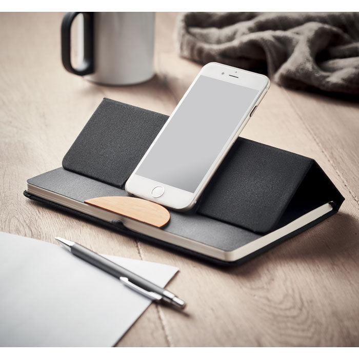 Branded A5 RPET Notebook with Bamboo Detail and Phone Stand in use