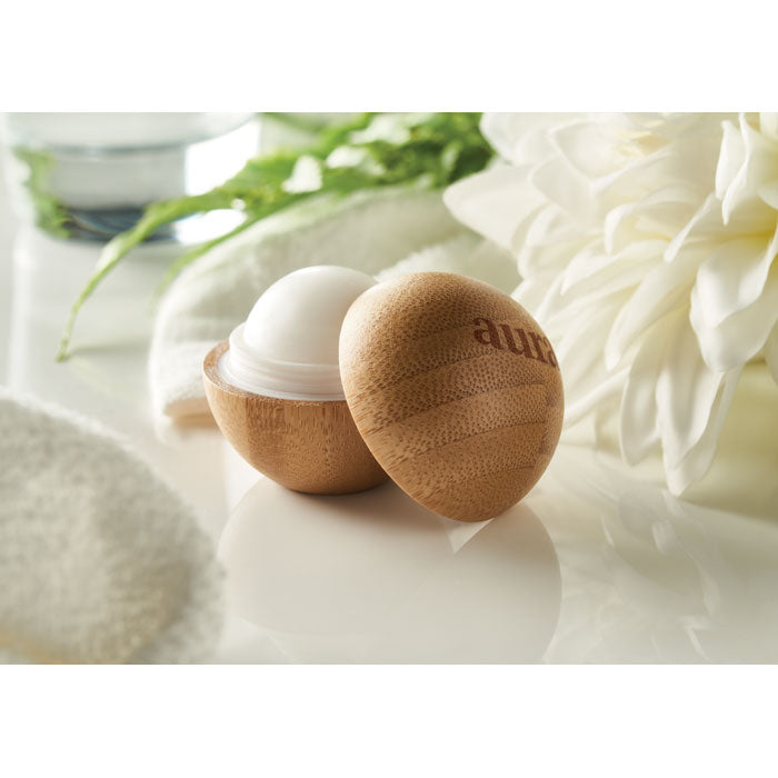 Branded Lip Balm in Round Bamboo Case in use