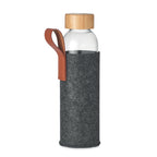 Branded glass bottle with bamboo lid and pouch