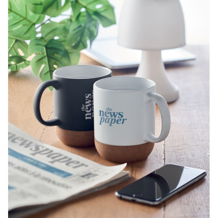 Branded matt mug with cork base, in use