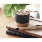 Branded 5.0 Round Wireless Speaker in use