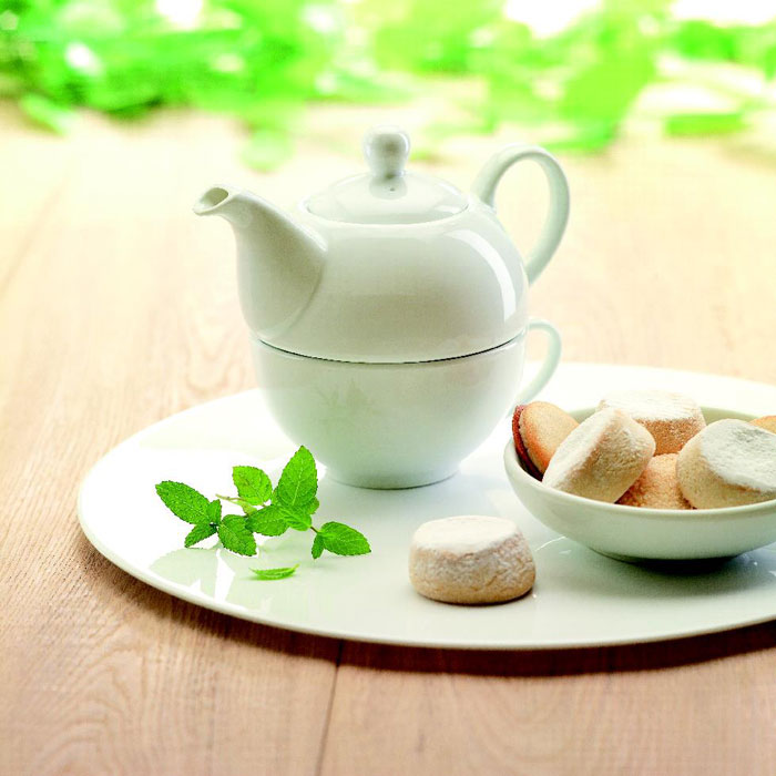 Branded Teapot and Cup Set 400ml in use