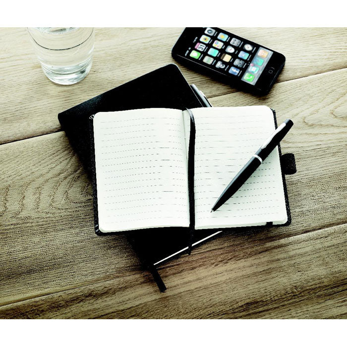 Branded A6 PU Notebook with Metal Pen in use