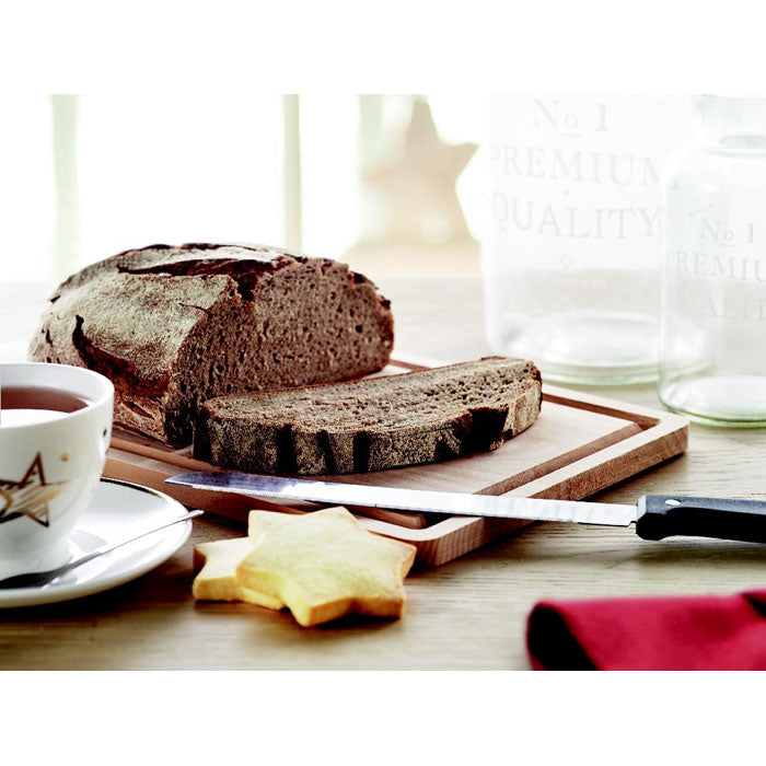 Branded Large Alder Wood Cutting Board in use