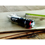 Branded Multi-Tool Torch with Safety Hammer in use
