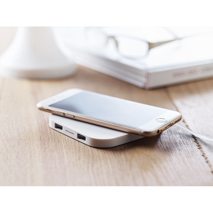 Branded Wireless Charging Pad with 2 Port USB Hub in use