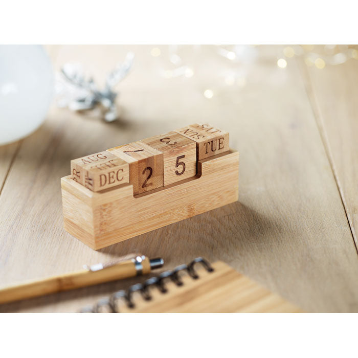 Branded Bamboo Block Perpetual Desktop Calendar in use