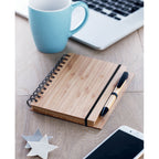 Branded Bamboo Cover Notebook with Pen in use