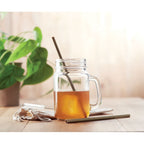 Branded Bamboo Straw Set with Brush in use