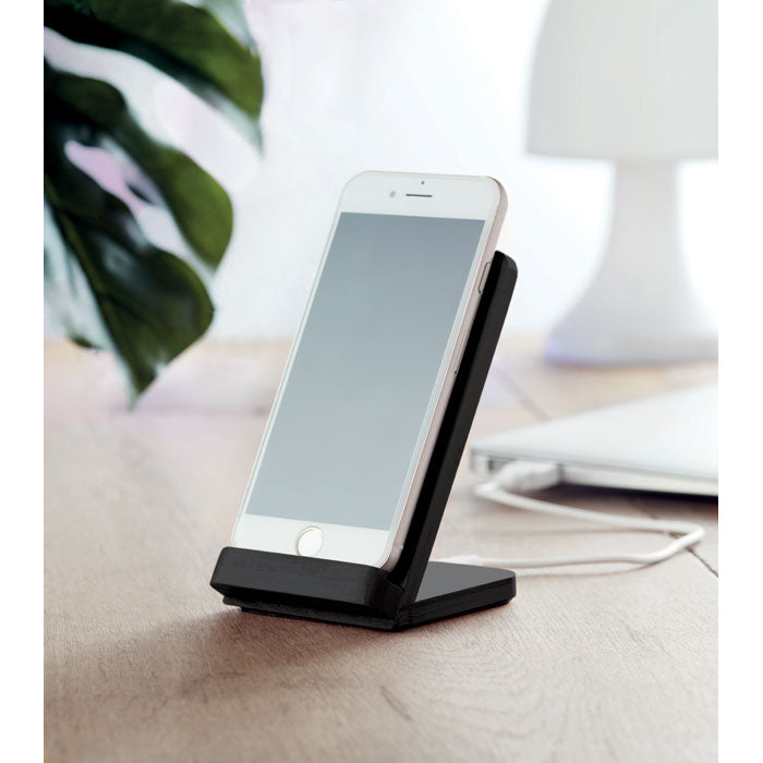 Branded Bamboo Wireless Charger Stand in use