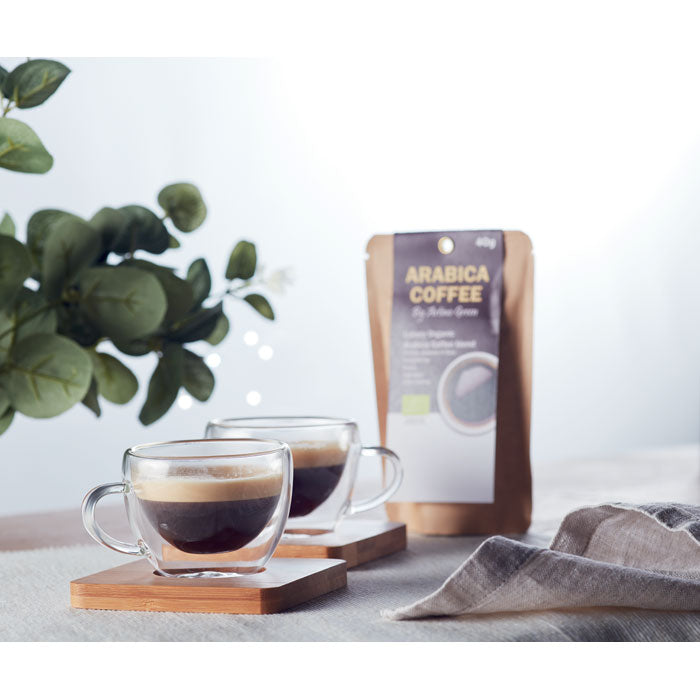 Branded Double Wall Espresso Glass Set in use
