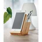 Branded Bamboo Phone & Pen Holder in use