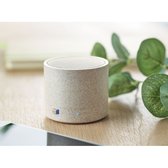 Branded Wheat Straw Wireless Speaker in use