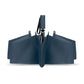 Folded navy blue umbrella on a white background