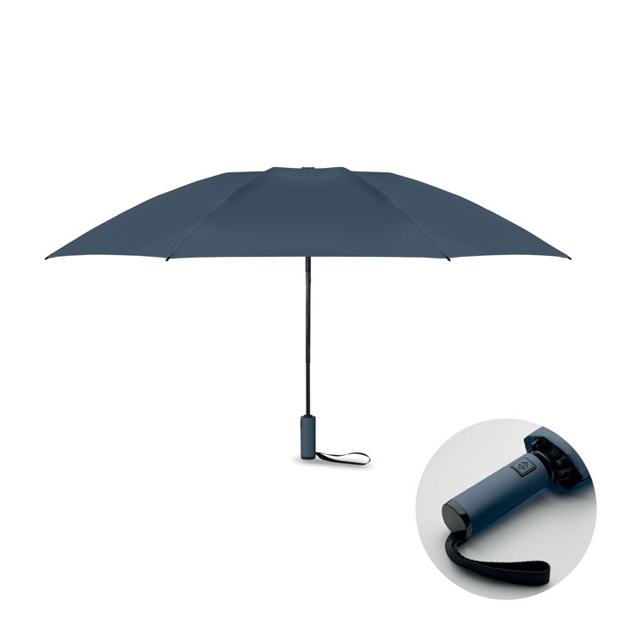 Blue umbrella with a close-up of the handle on a white background