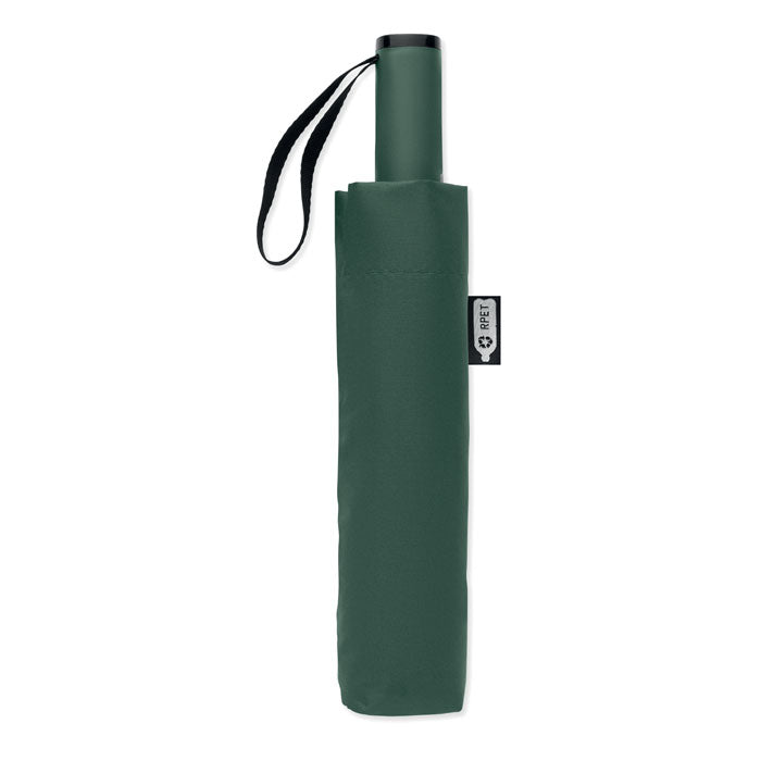 Green umbrella folded and in a carrying case on a white background