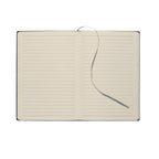Open notebook with lined pages on a white background