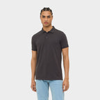 Model wearing a branded easy care men's polo shirt