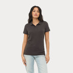 Model wearing a branded easy care women's polo shirt