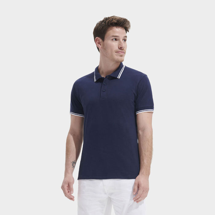 Model wearing a branded fitted stripe men's polo shirt