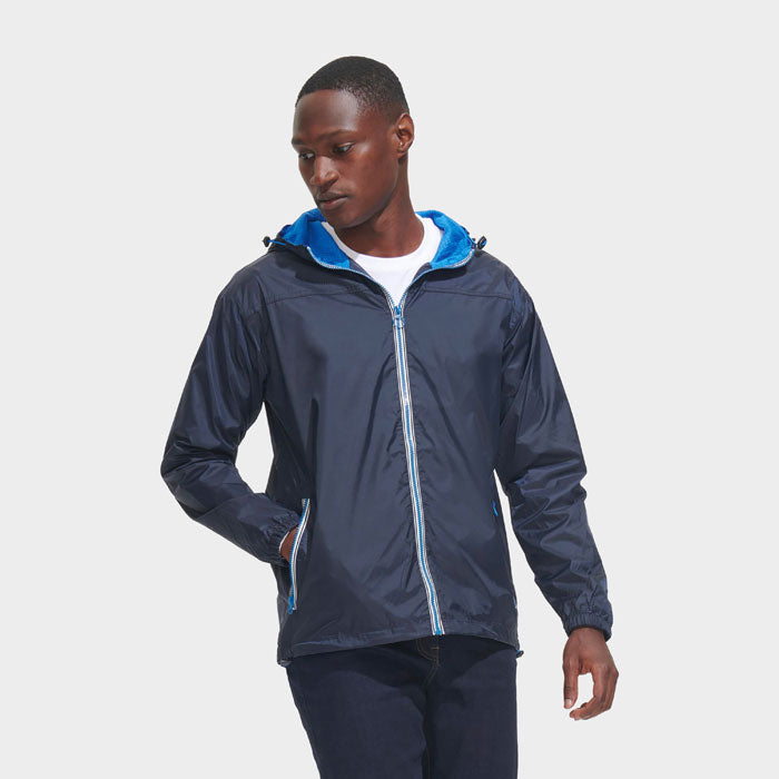 Model wearing a branded lined windbreaker