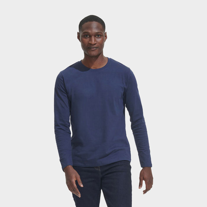 Model wearing a branded heavyweight long sleeve t-shirt