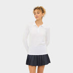 Model wearing a branded long sleeve women's polo shirt
