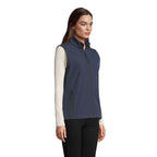 Branded women's softshell gilet, side view