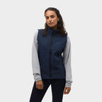 Model wearing a branded women's softshell gilet