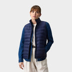Model wearing a branded women's packable down gilet