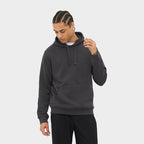 Model wearing a branded brushed fleece pullover hoodie