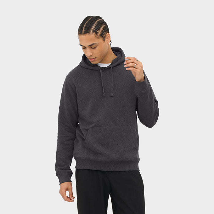 Model wearing a branded brushed fleece pullover hoodie