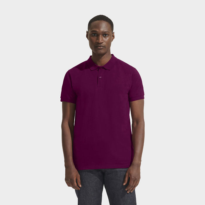 Model wearing a branded organic pique men's polo shirt