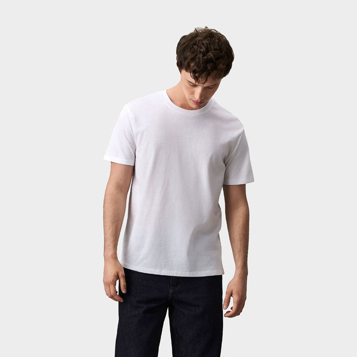Model wearing a branded recycled offcut t-shirt