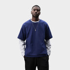 Model wearing a branded recycled oversized t-shirt