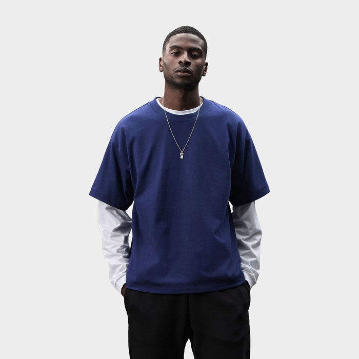 Model wearing a branded recycled oversized t-shirt