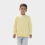 Model wearing a branded kids round-neck sweatshirt